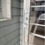 Lock with door latch guard installed. Protects from breaks in.